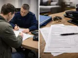 Policjant w mundurze spisuje protokół policyjny z mężczyzną. Na stole leżą dokumenty i długopis.