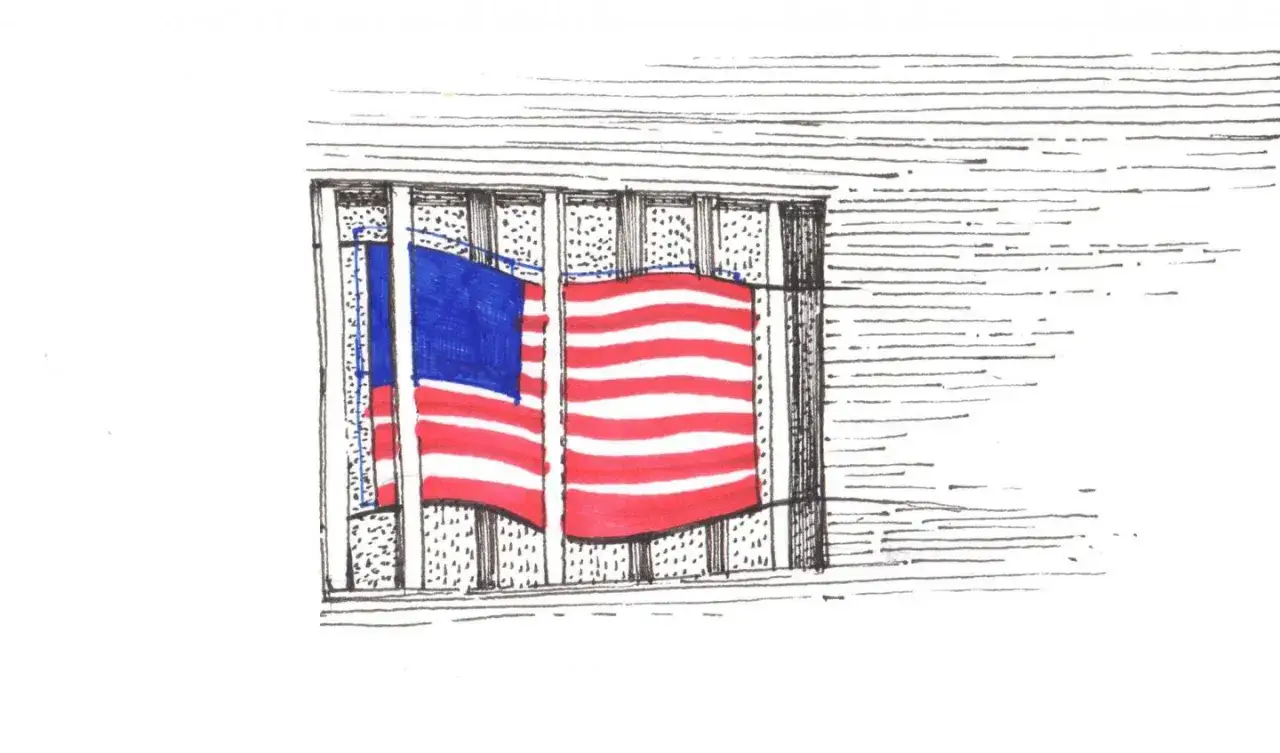 Amerykańska flaga za kratami, symbol wolności uwięzionej w więzieniach w USA.